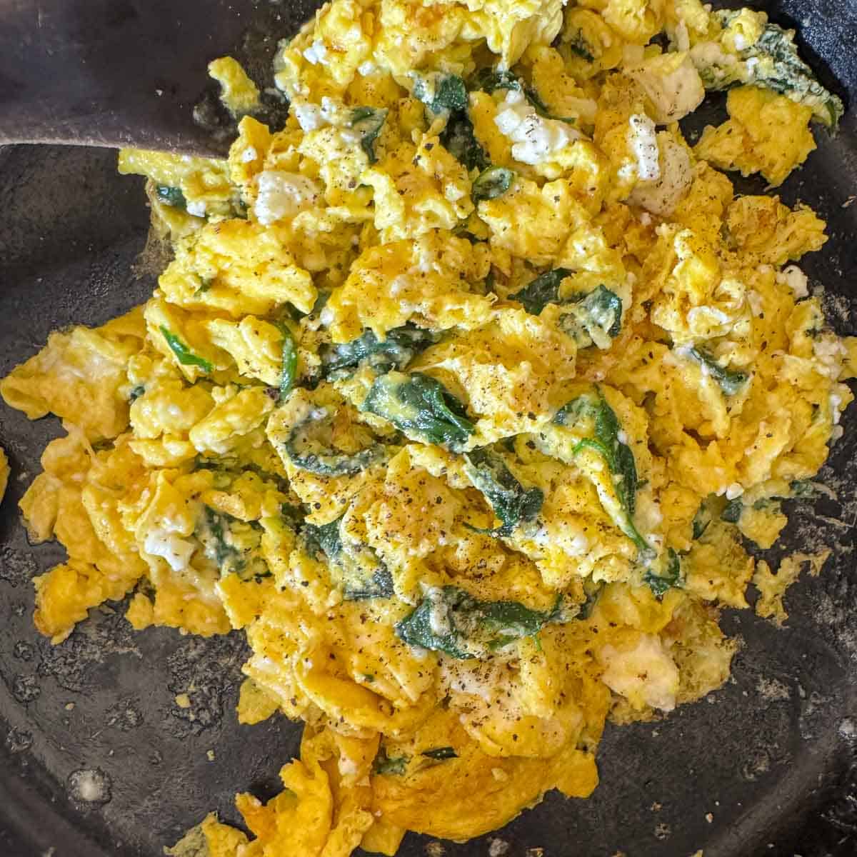 scrambled eggs with greens.