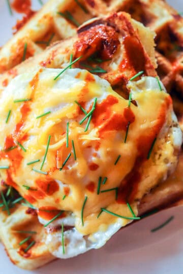 shaggy mane waffles topped with an egg and chopped chives.