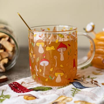 red belted polypore tea in a mushroom cup.