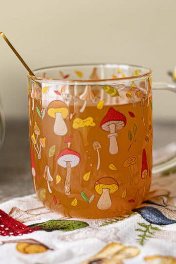 red belted polypore tea in a mushroom cup.