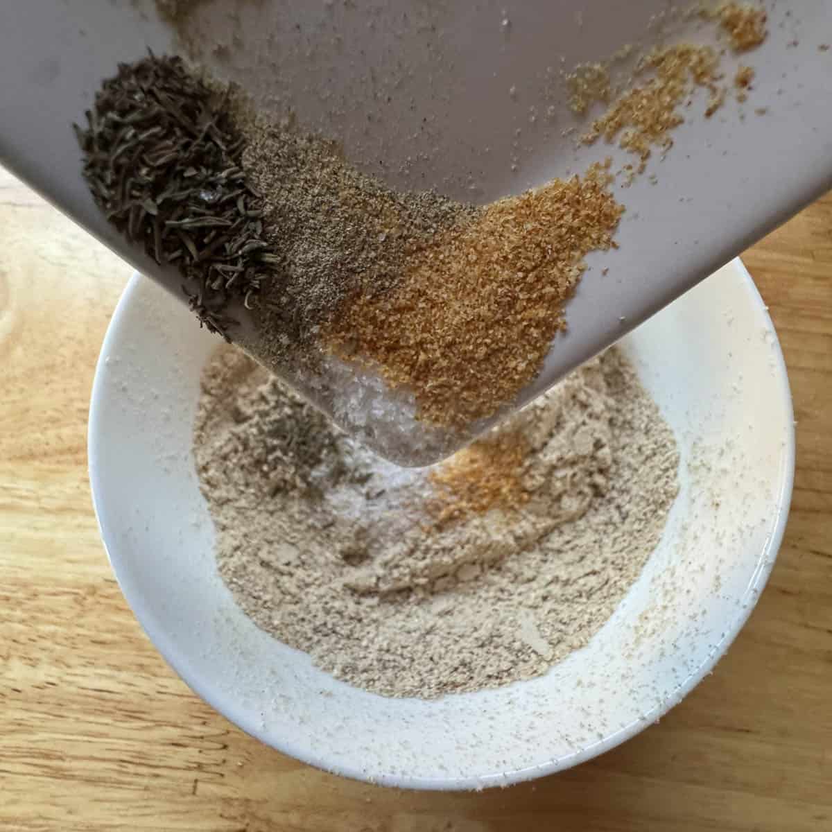 adding spices to mushroom seasoning