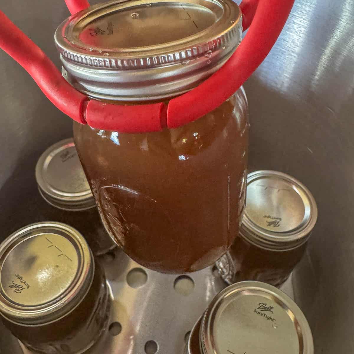 removing pressure canned broth from canner