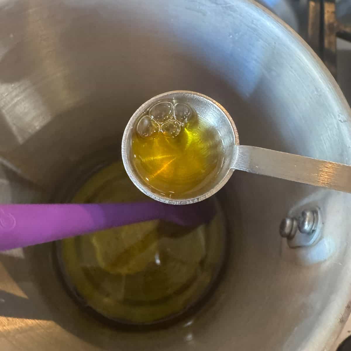 vitamin e being added to a pot