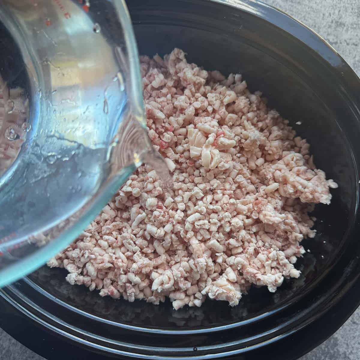 adding water to ground beef fat in a crockpot