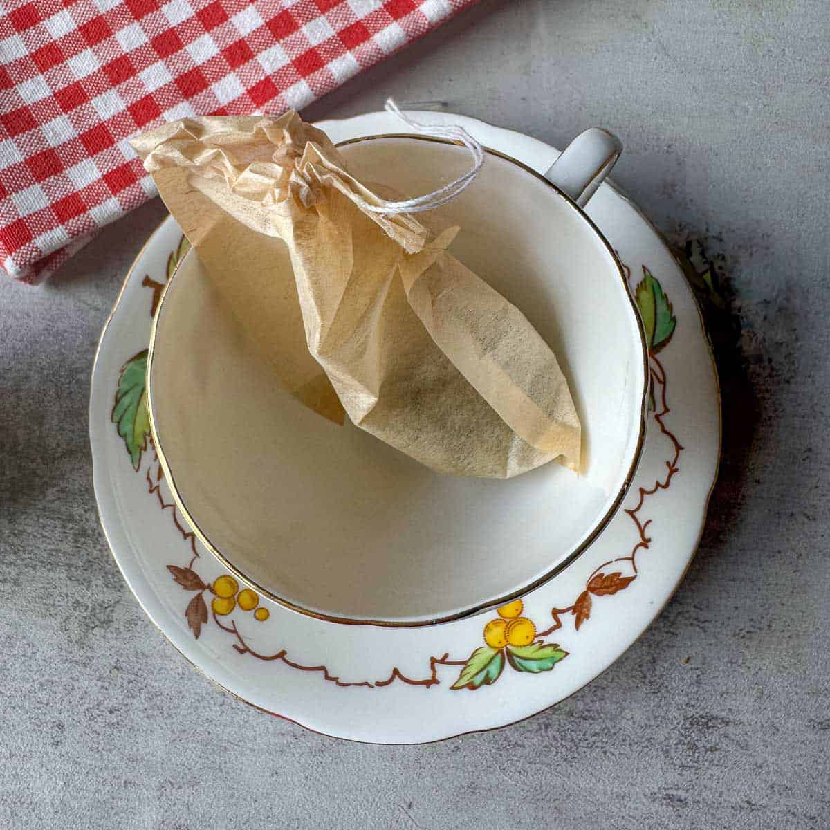 a cup with a tea bag in it