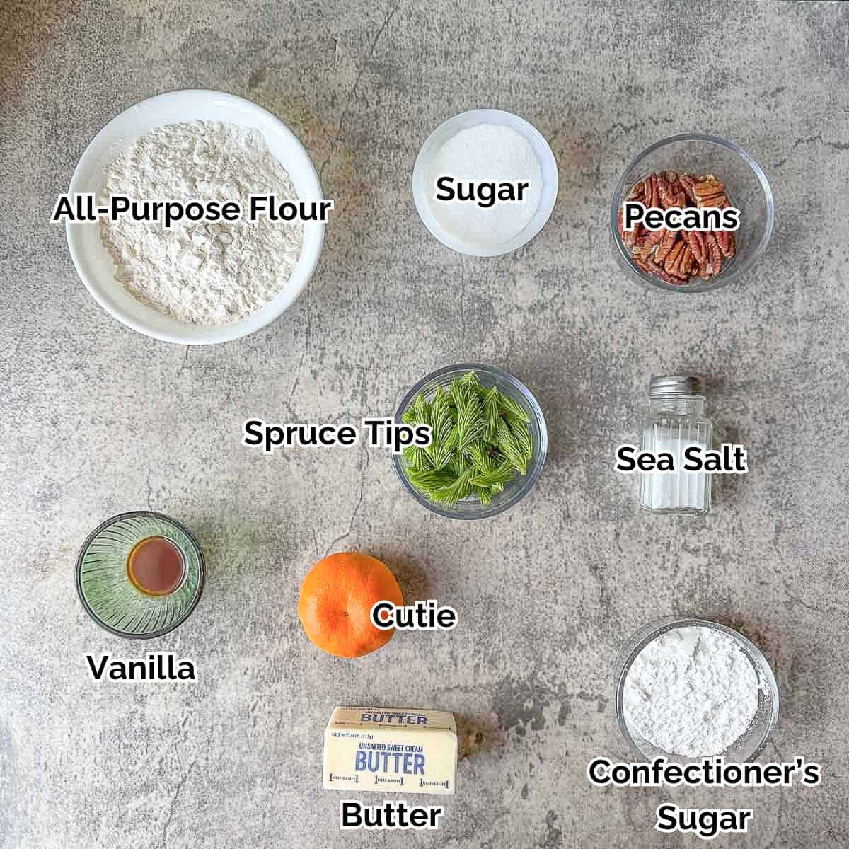 spruce tip cookie ingredients including spruce tips, sugar, flour, pecans, orange, and butter