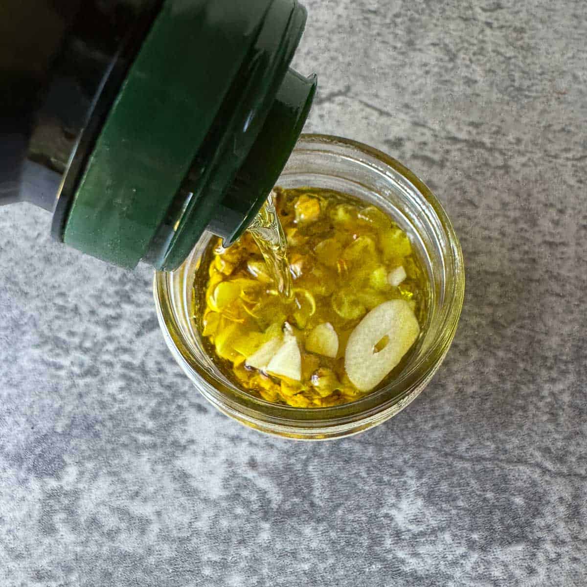 mullein flowers and garlic in a jar of oil.
