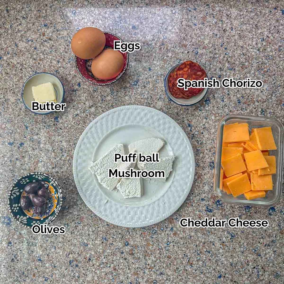 giant puffball mushroom omelette ingredients including mushroom, eggs, chorizo and cheese