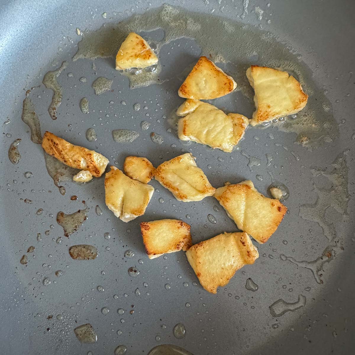 mushroom being sautéed